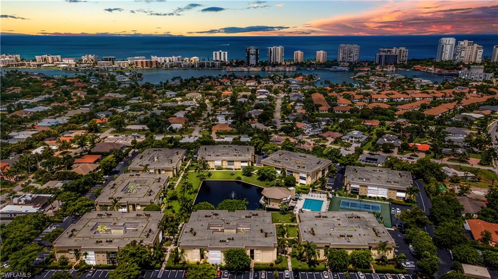 788 Park Shore Drive, Unit E20 Naples, FL 34103 - Photo 27 of 37 an aerial view of multiple house