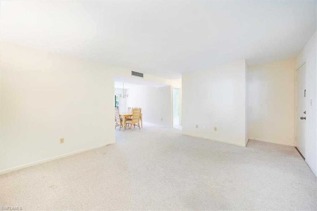 788 Park Shore Drive, Unit E20 Naples, FL 34103 - Photo 8 of 37 a view of an empty room