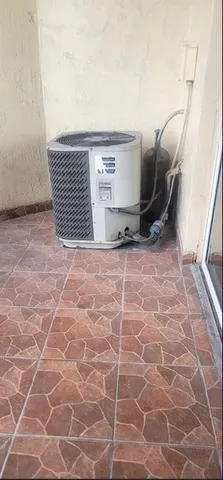 a view of a door and a sink