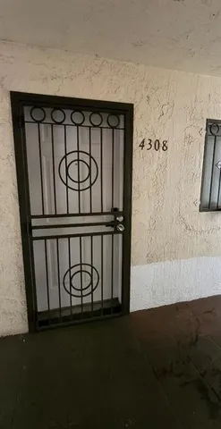 a front view of a building with gym equipment