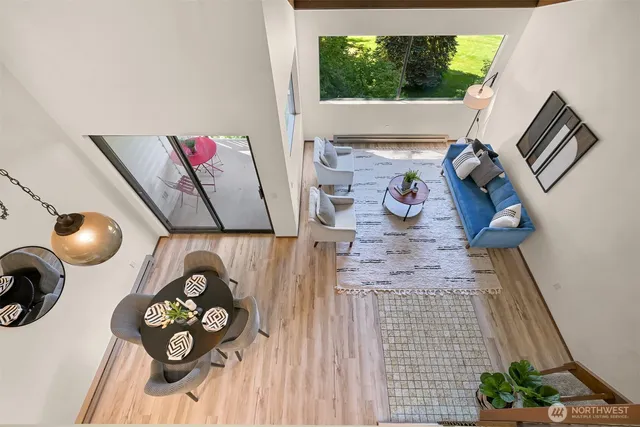 a view of living room with furniture and a window