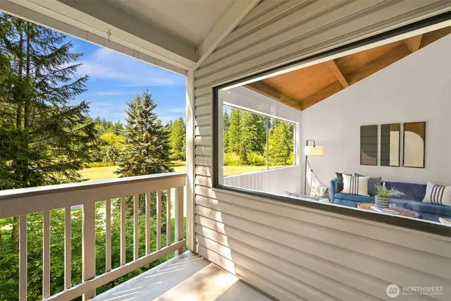 a view of a porch and wooden floor