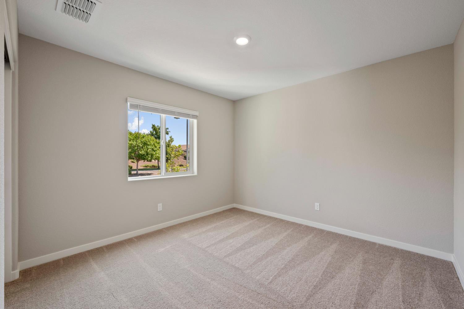 2578 Bog Street Lincoln, CA 95648 - Photo 17 of 19 an empty room with a window
