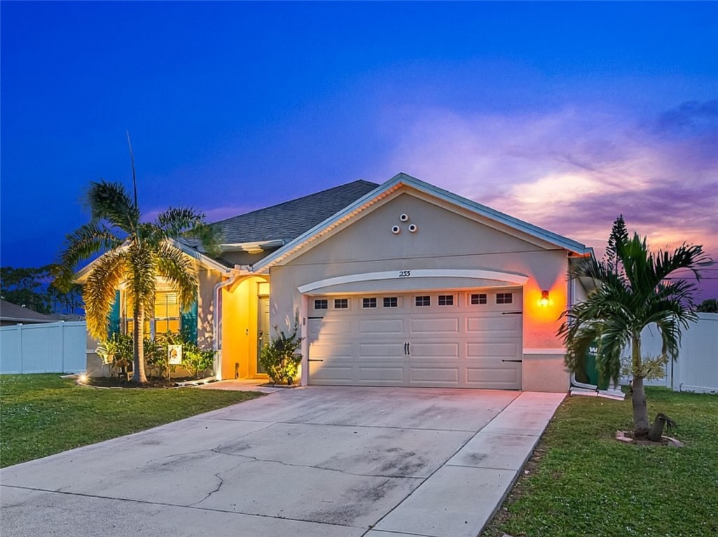 233 Periwinkle Drive Sebastian, FL 32958 - Photo 1 of 34 a front view of house with a yard