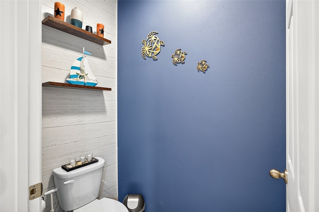 233 Periwinkle Drive Sebastian, FL 32958 - Photo 15 of 34 a bathroom with a toilet and a sink