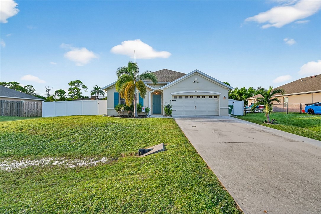 233 Periwinkle Drive Sebastian, FL 32958 - Photo 27 of 34 a view of house with garden