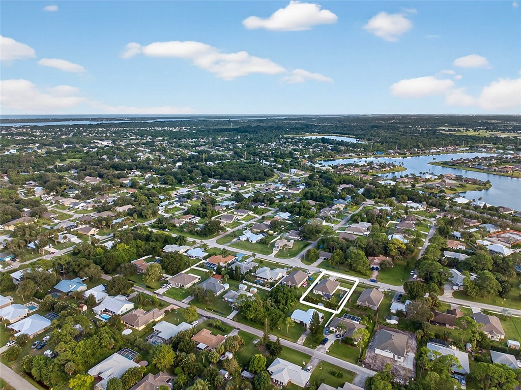 233 Periwinkle Drive Sebastian, FL 32958 - Photo 30 of 34 an aerial view of residential houses with outdoor space