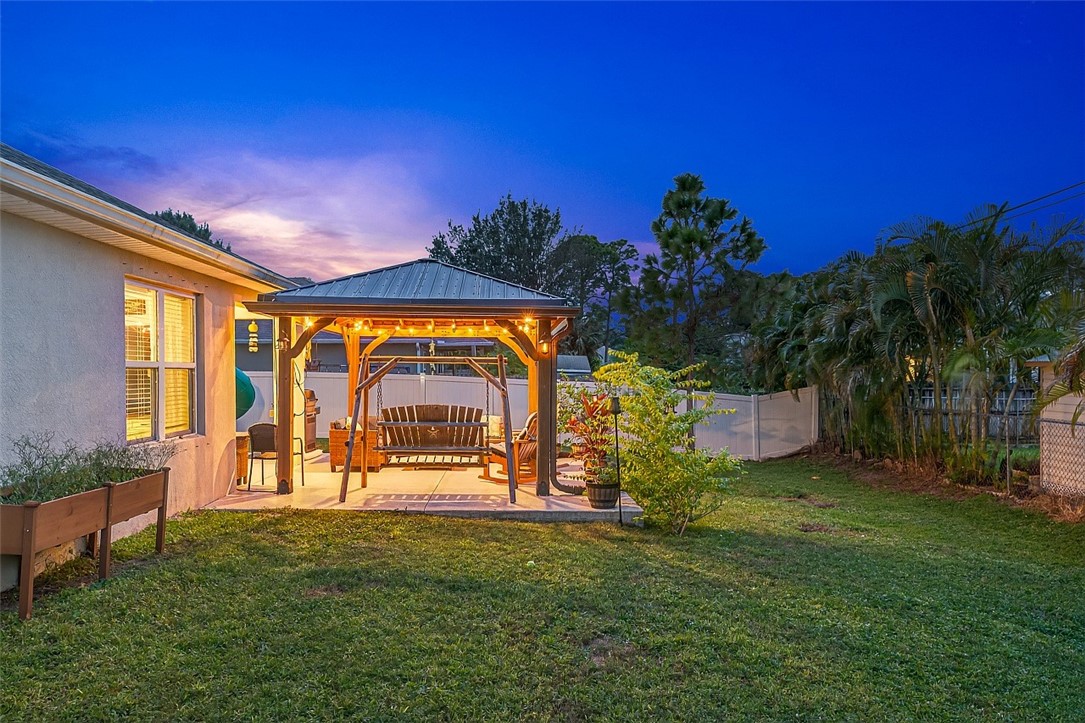 233 Periwinkle Drive Sebastian, FL 32958 - Photo 31 of 34 a view of a house with a big yard