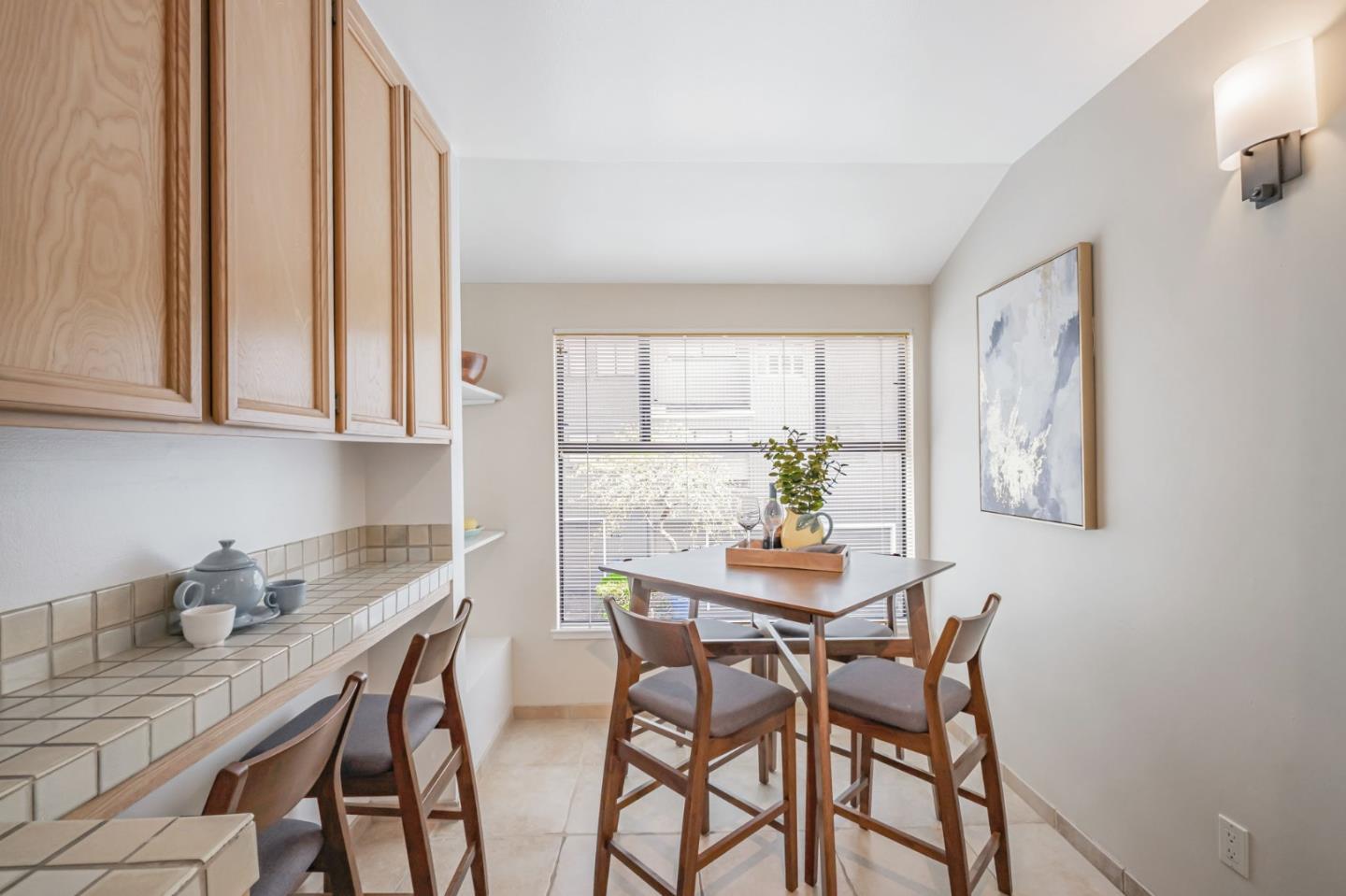 1067 Vía Tornasol Aptos, CA 95003 - Photo 13 of 38 a view of a dining room with furniture and window