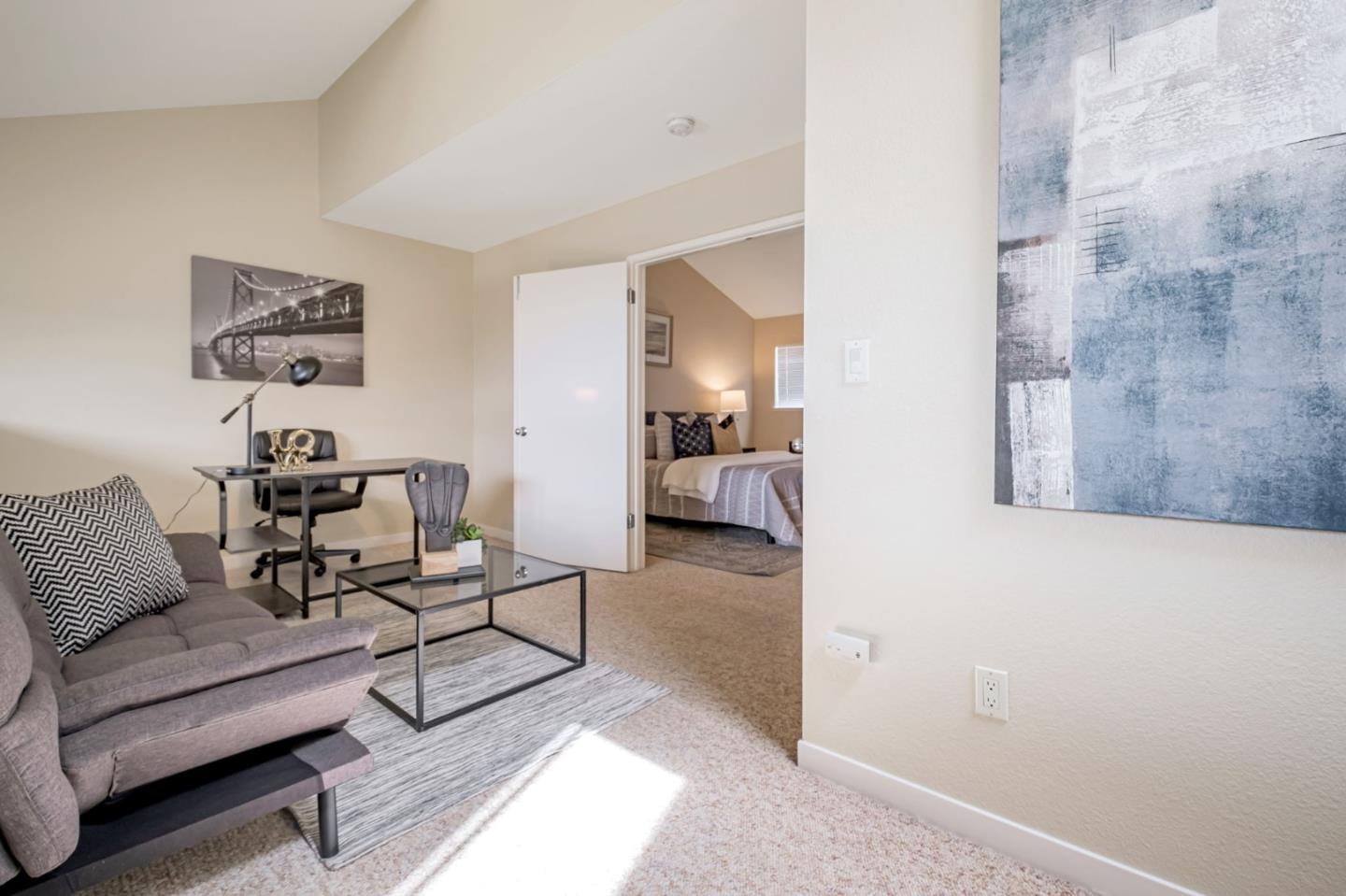 1067 Vía Tornasol Aptos, CA 95003 - Photo 17 of 38 a living room with furniture and a table