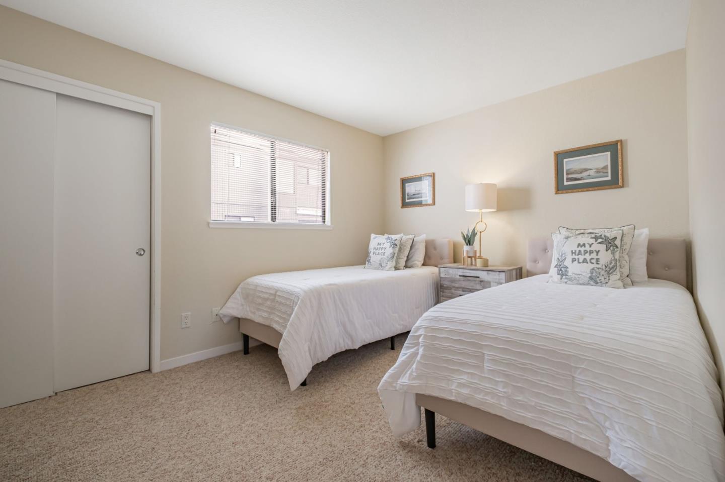 1067 Vía Tornasol Aptos, CA 95003 - Photo 21 of 38 a bedroom with two beds and a window