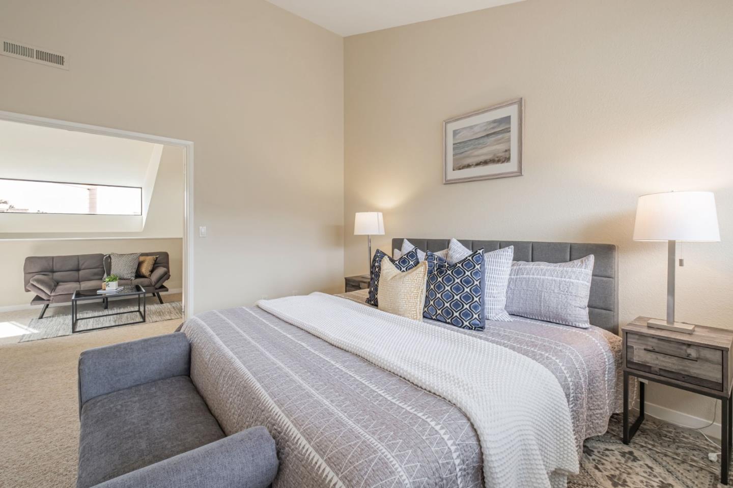 1067 Vía Tornasol Aptos, CA 95003 - Photo 23 of 38 a bed room with a bed and a couch
