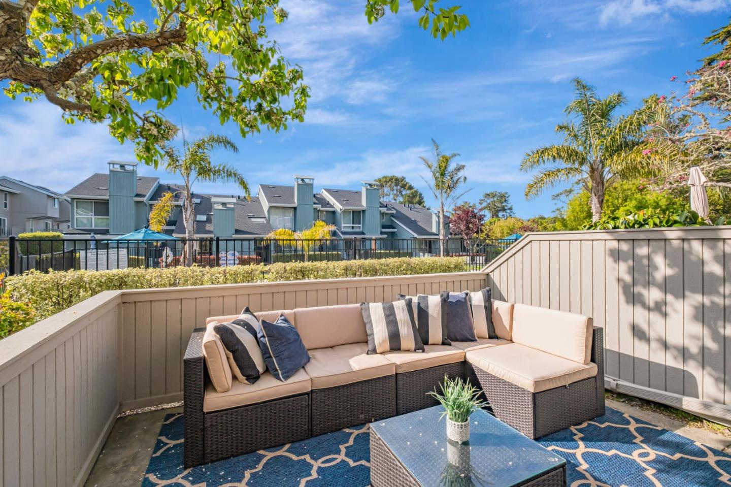 1067 Vía Tornasol Aptos, CA 95003 - Photo 30 of 38 a roof deck with couches and potted plants