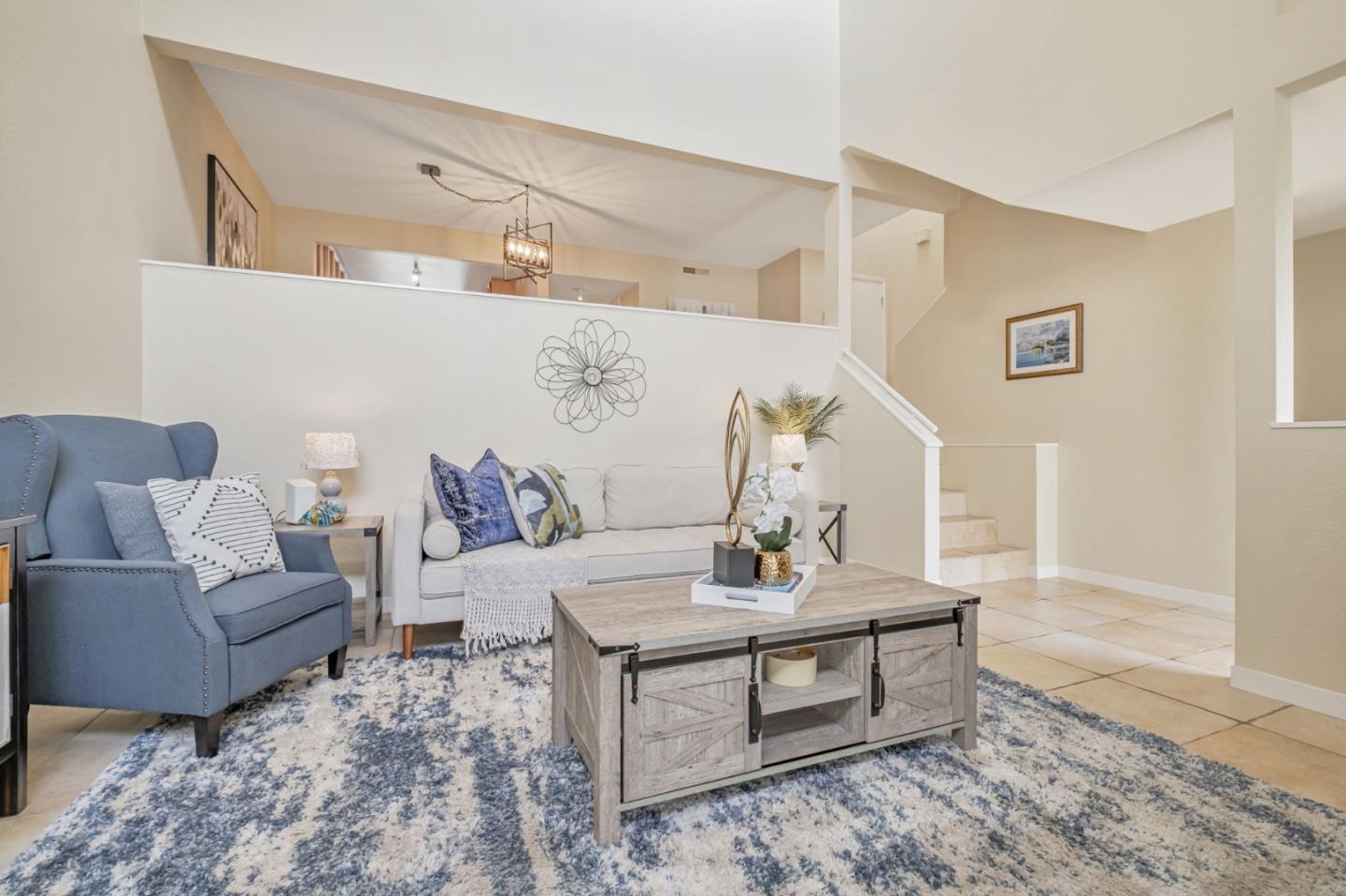 1067 Vía Tornasol Aptos, CA 95003 - Photo 6 of 38 a living room with furniture and wooden floor