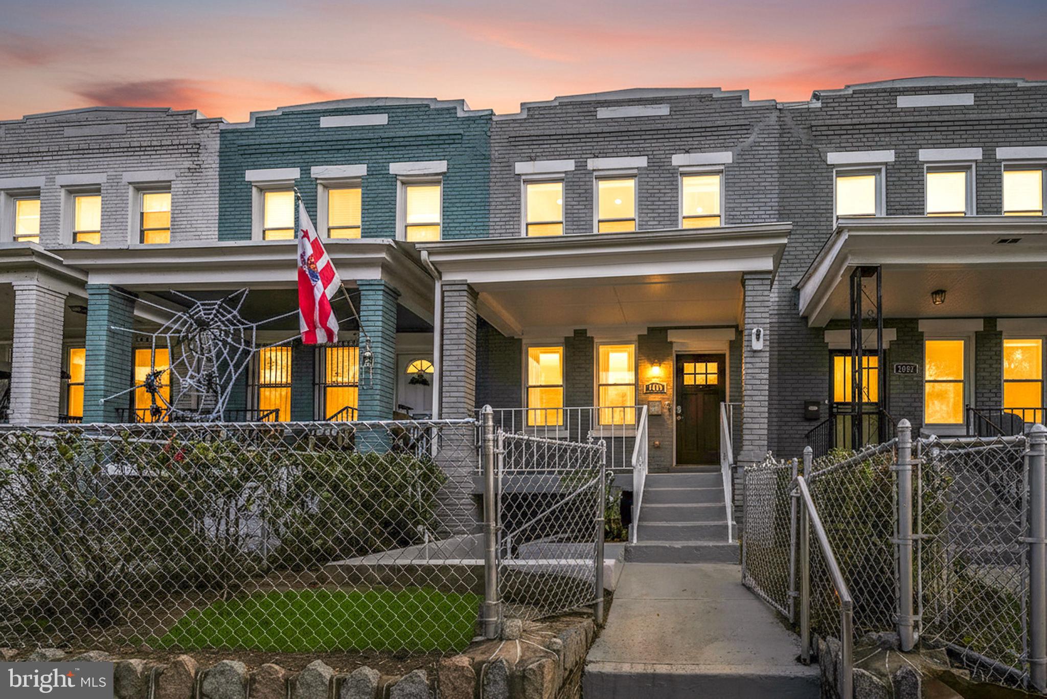 1423 Montello Avenue Northeast Washington, DC 20002 - Photo 1 of 30 front view of a house with a glass door
