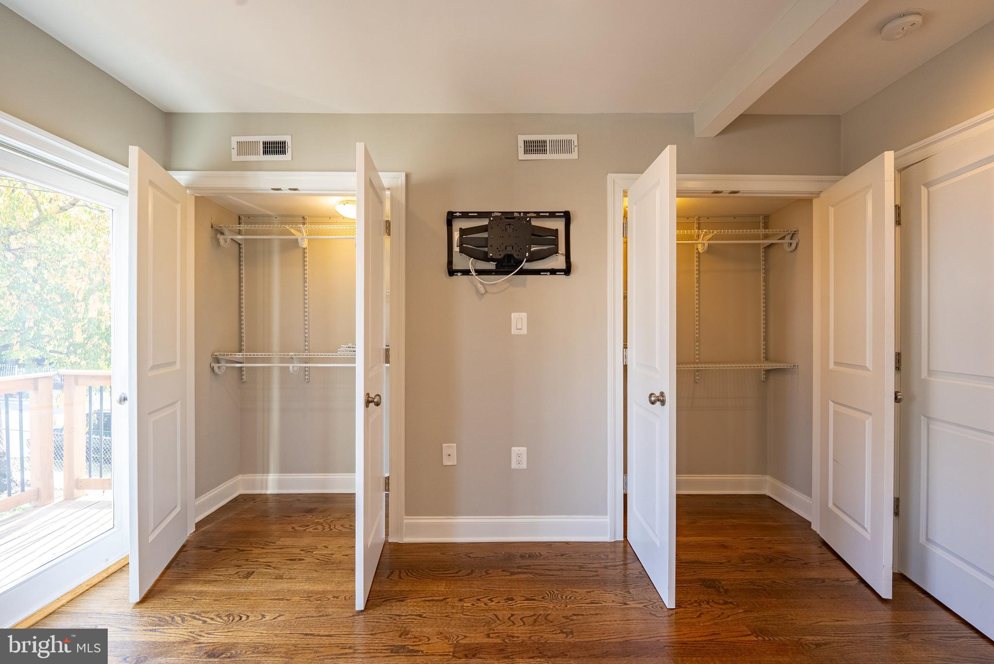 1423 Montello Avenue Northeast Washington, DC 20002 - Photo 18 of 30 a view of a hallway with wooden floor and a cabinet