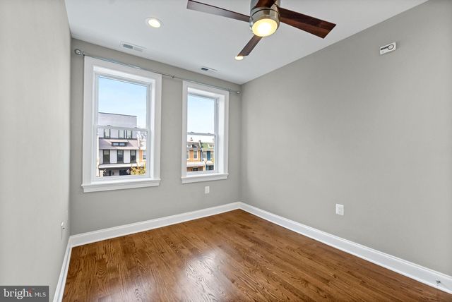 a view of balcony with furniture