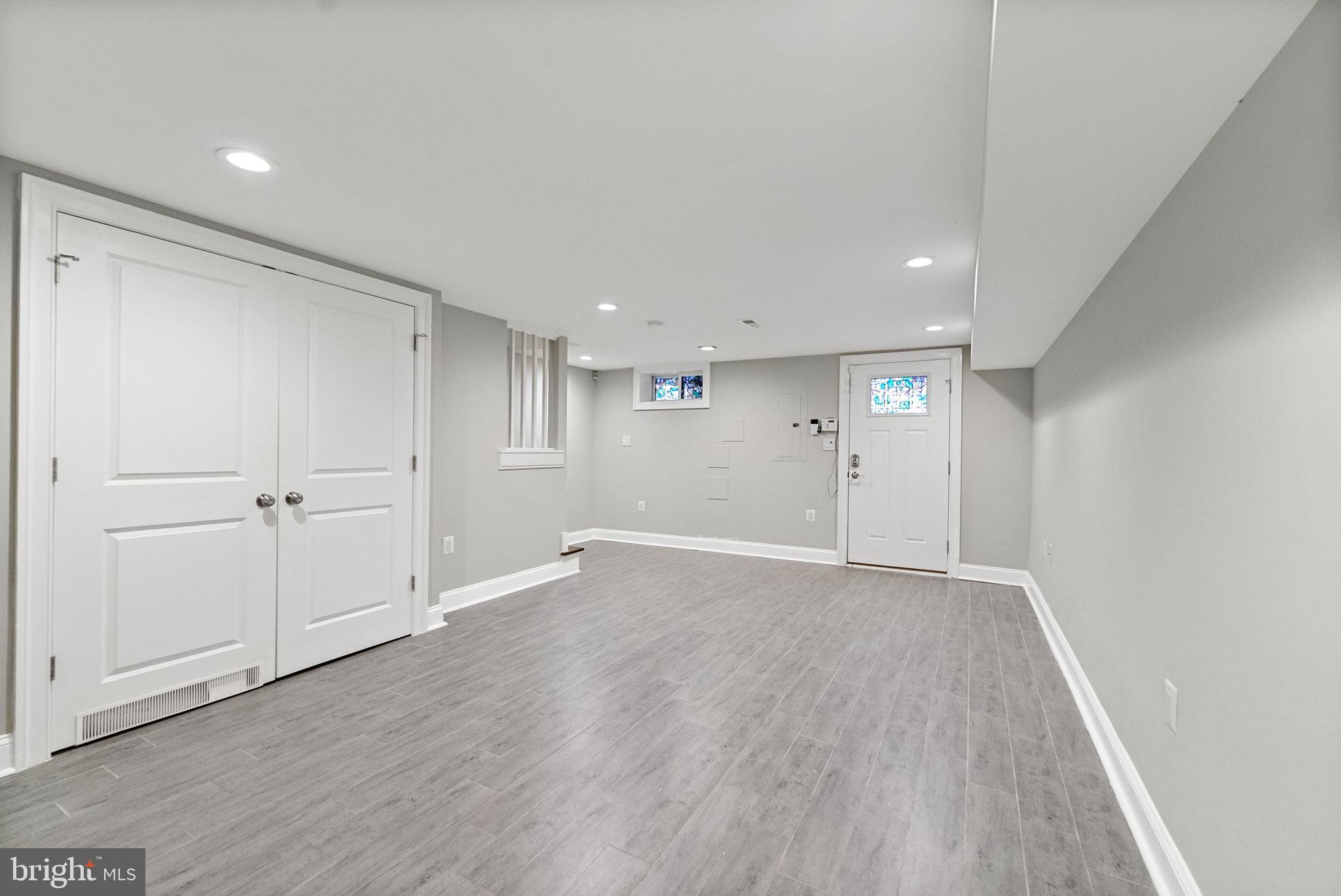 1423 Montello Avenue Northeast Washington, DC 20002 - Photo 24 of 30 a view of an empty room with wooden floor