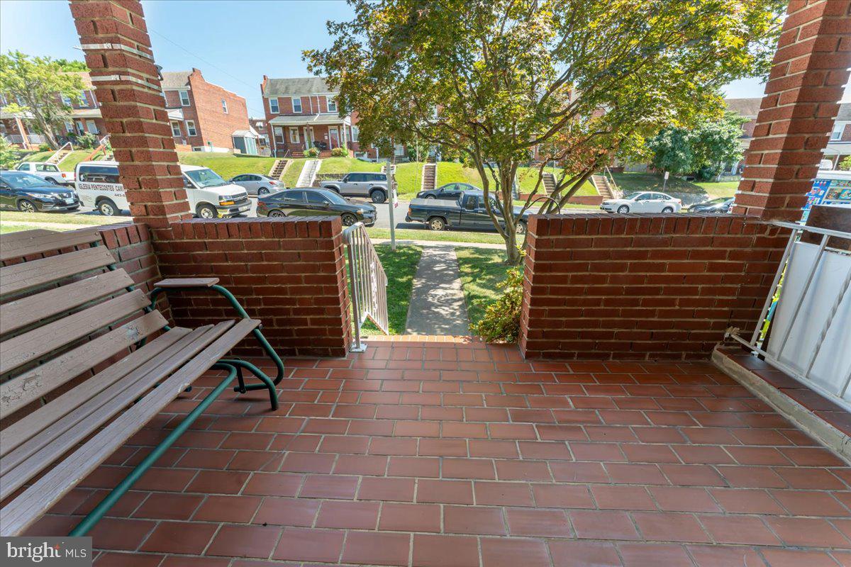 7024 Conley Street Baltimore, MD 21224 - Photo 3 of 20 a view of a terrace with chairs