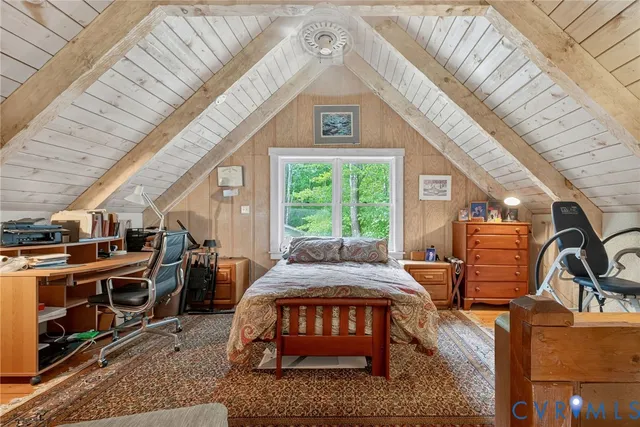a view of a house with backyard porch and furniture