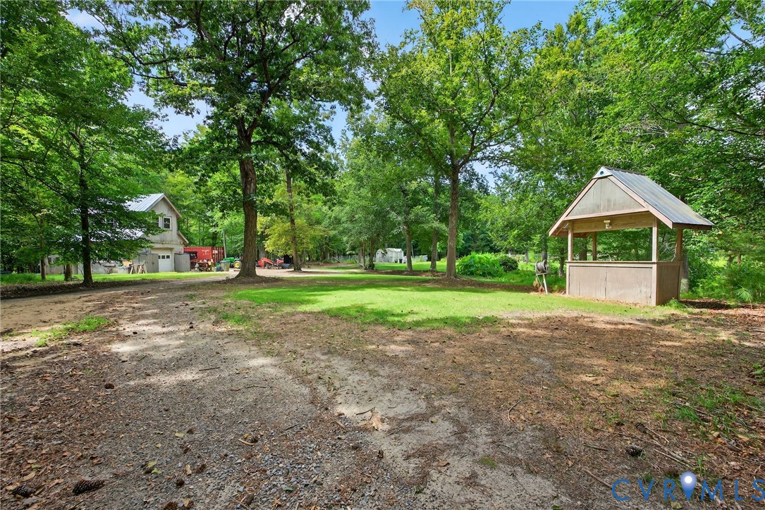 21407 Old Neck Road Charles City, VA 23030 - Photo 35 of 50 a view of a house with a yard