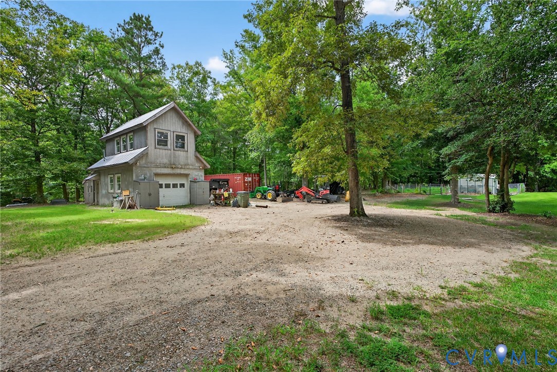21407 Old Neck Road Charles City, VA 23030 - Photo 36 of 50 a view of a house with a street