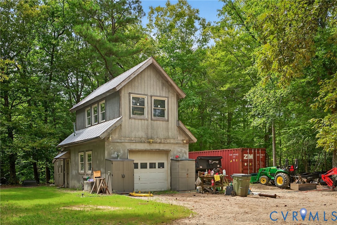 21407 Old Neck Road Charles City, VA 23030 - Photo 37 of 50 a front view of a house with a yard