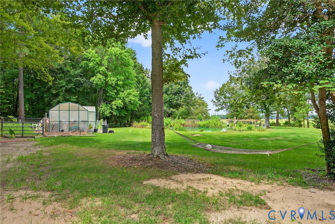 21407 Old Neck Road Charles City, VA 23030 - Photo 38 of 50 a view of a garden with a tree in the park
