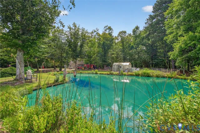 a garden view with a fountain
