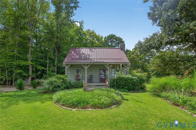 a view of a house with a garden