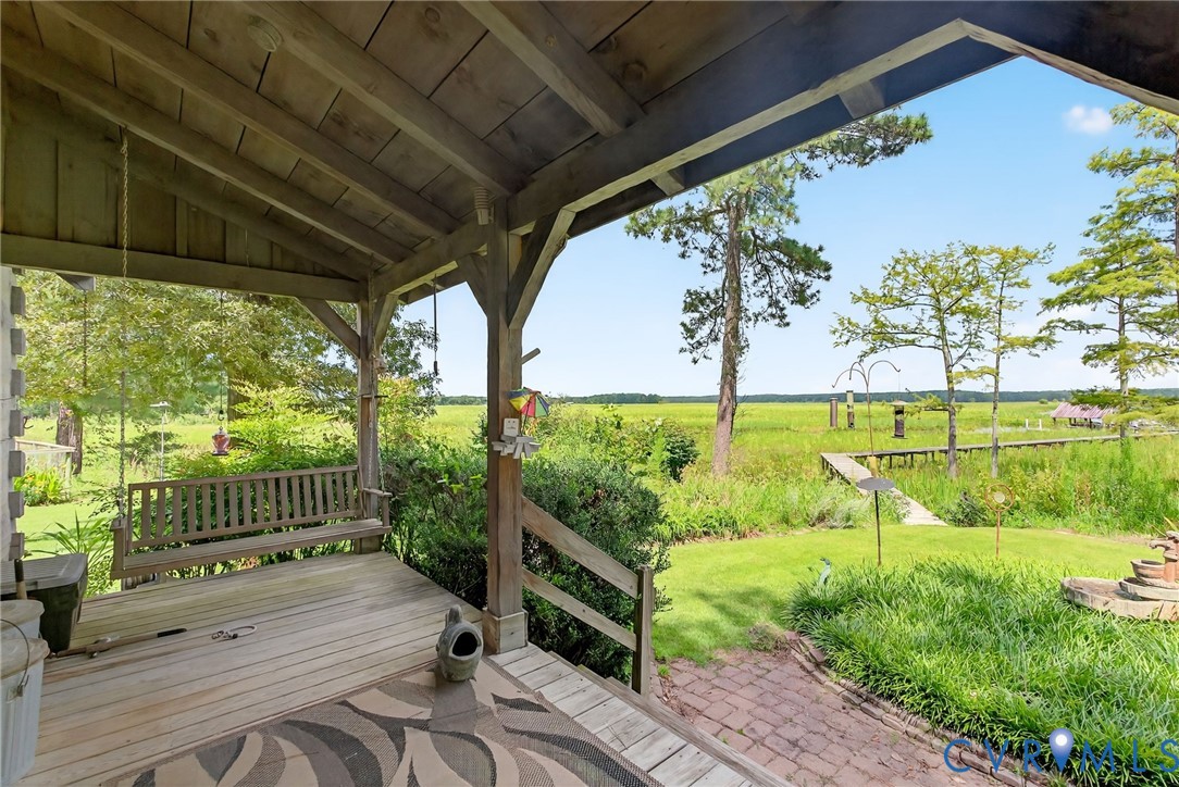 21407 Old Neck Road Charles City, VA 23030 - Photo 48 of 50 a view of a porch with wooden floor