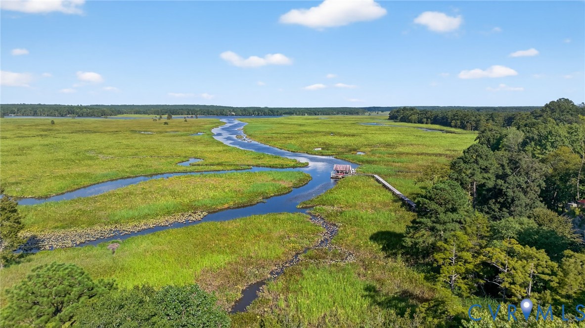21407 Old Neck Road Charles City, VA 23030 - Photo 10 of 50 a view of an ocean and a yard