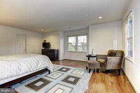 1901 Ednor Road Silver Spring, MD 20905 - Photo 14 of 30 a bed room with a bed and a couch