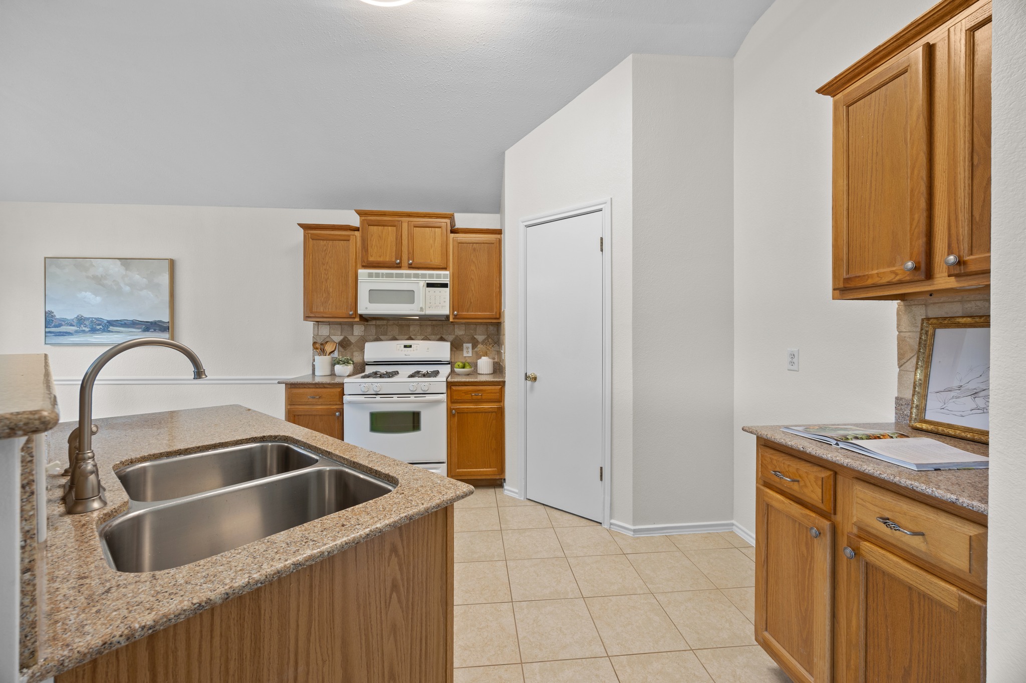 8219 Edgemoor Place Austin, TX 78749 - Photo 15 of 30 Open kitchen with updated countertops.