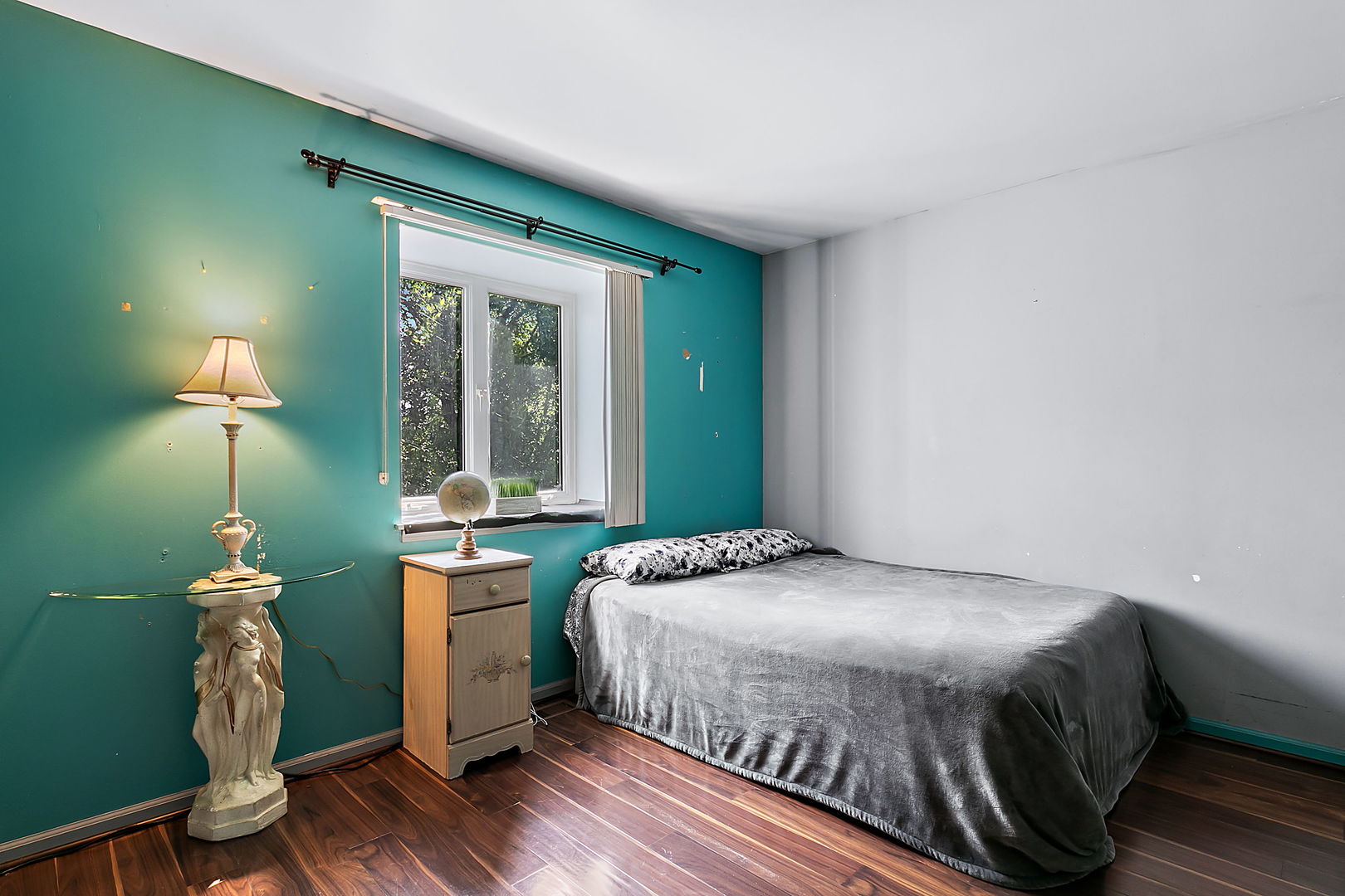 116 Hampton Avenue Westmont, IL 60559 - Photo 12 of 19 a bedroom with a bed and a chandelier