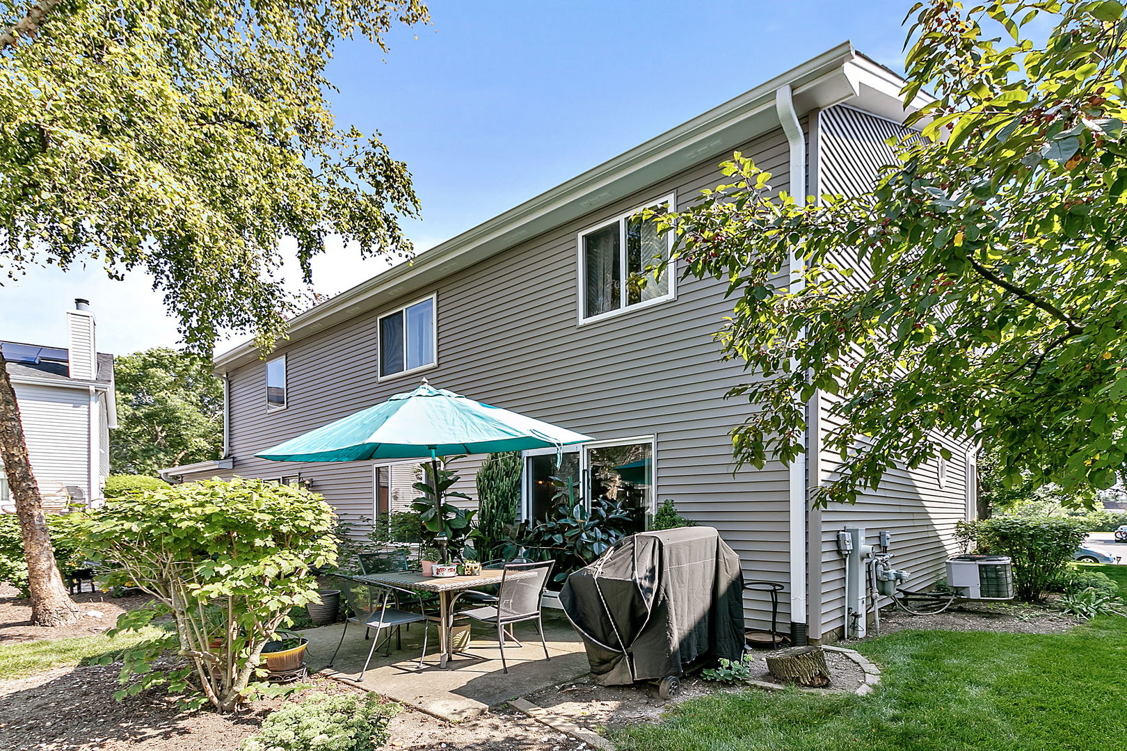 116 Hampton Avenue Westmont, IL 60559 - Photo 14 of 19 a view of backyard with outdoor seating and plants