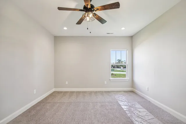 a bathroom with a tub and shower