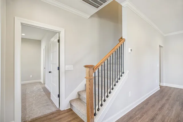 a view of a house with a yard and a large window