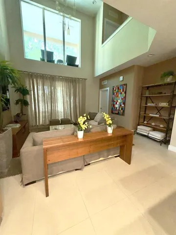 a living room with a couch and a flat screen tv