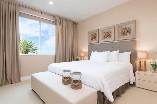 a bathroom with a granite countertop sink a toilet and mirror