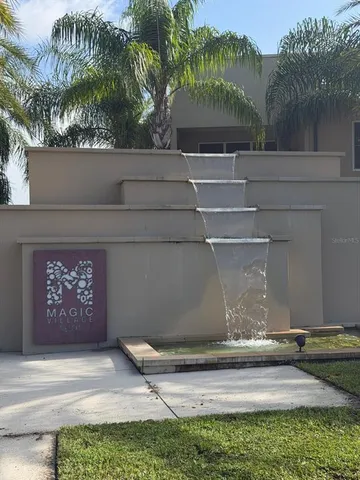 a backyard of a house with a yard and garage