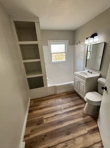 a bathroom with a sink and a toilet