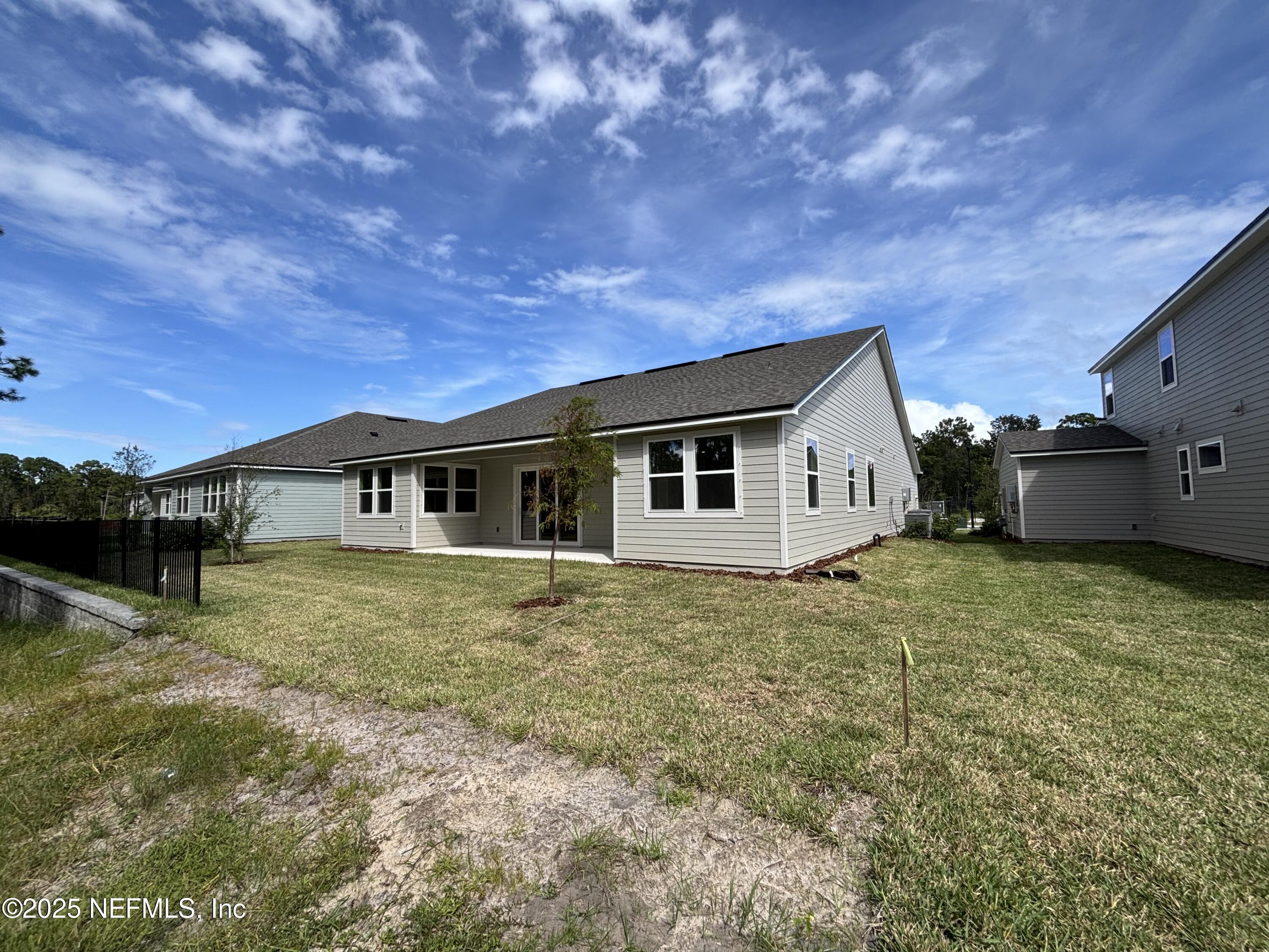 67 Pegasus Road Flagler Beach, FL 32136 - Photo 31 of 34 a house view with a garden space