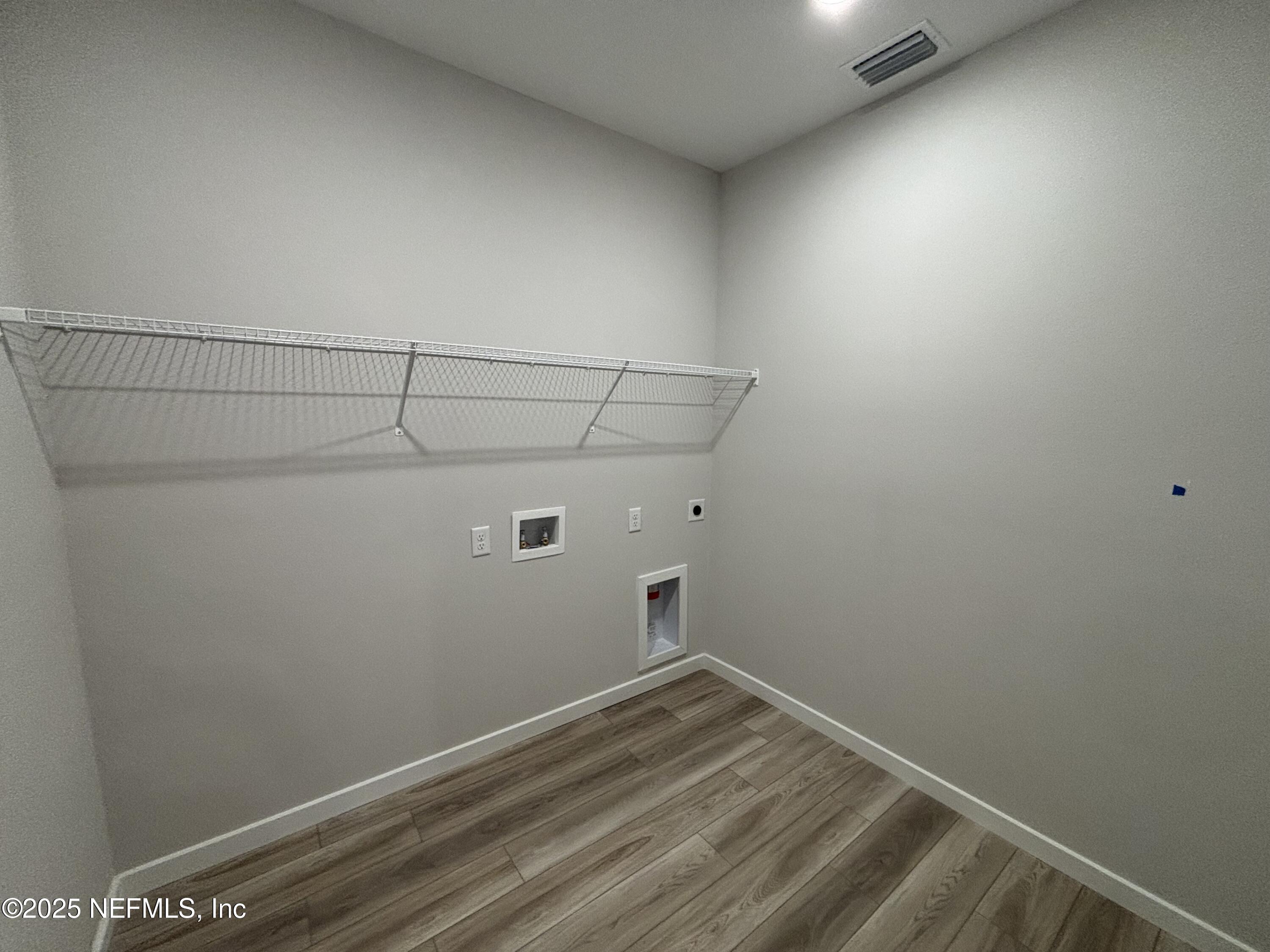 67 Pegasus Road Flagler Beach, FL 32136 - Photo 34 of 34 a view of a room with racks on the wall