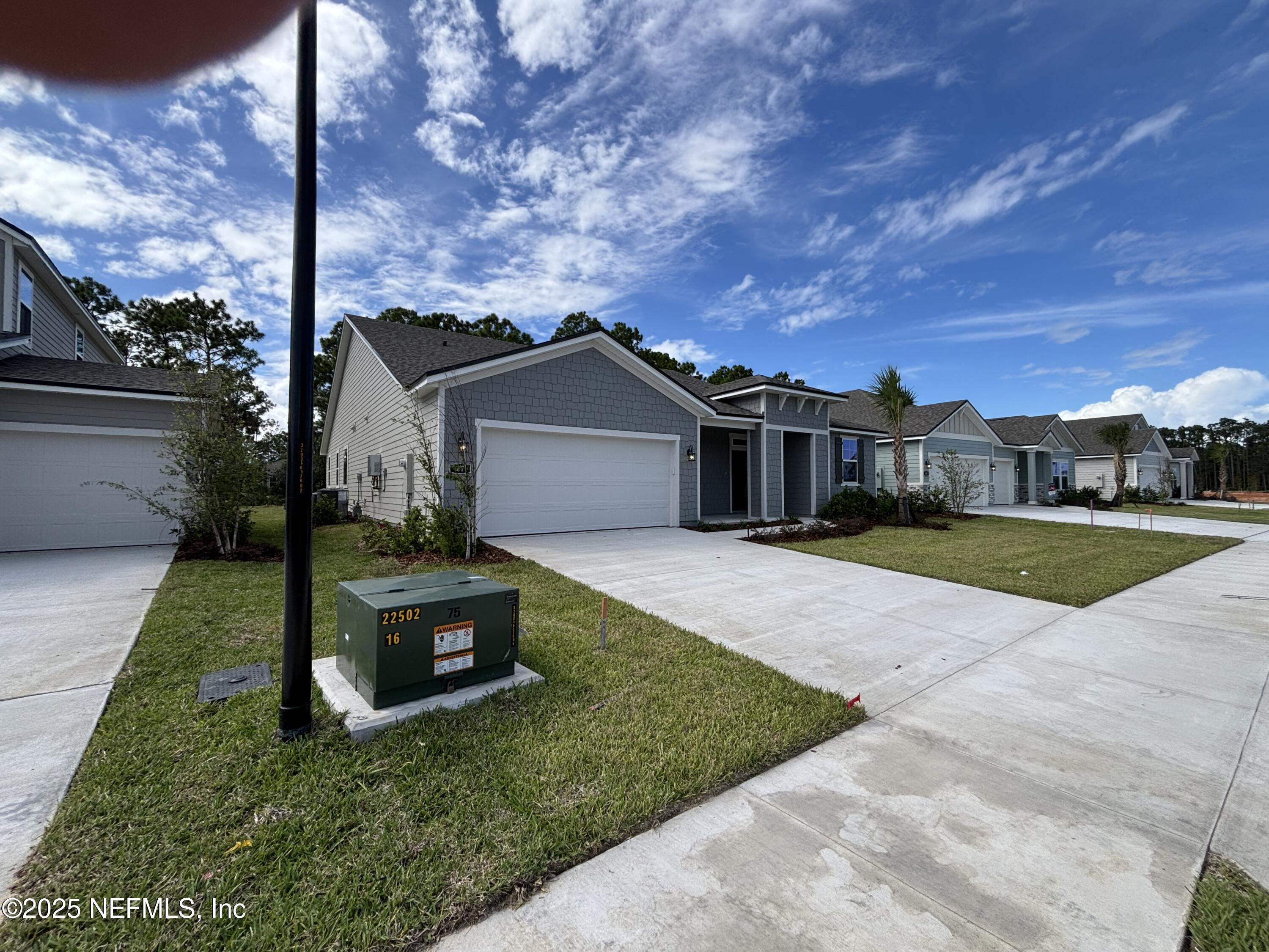 67 Pegasus Road Flagler Beach, FL 32136 - Photo 5 of 34 a view of a house with backyard and porch