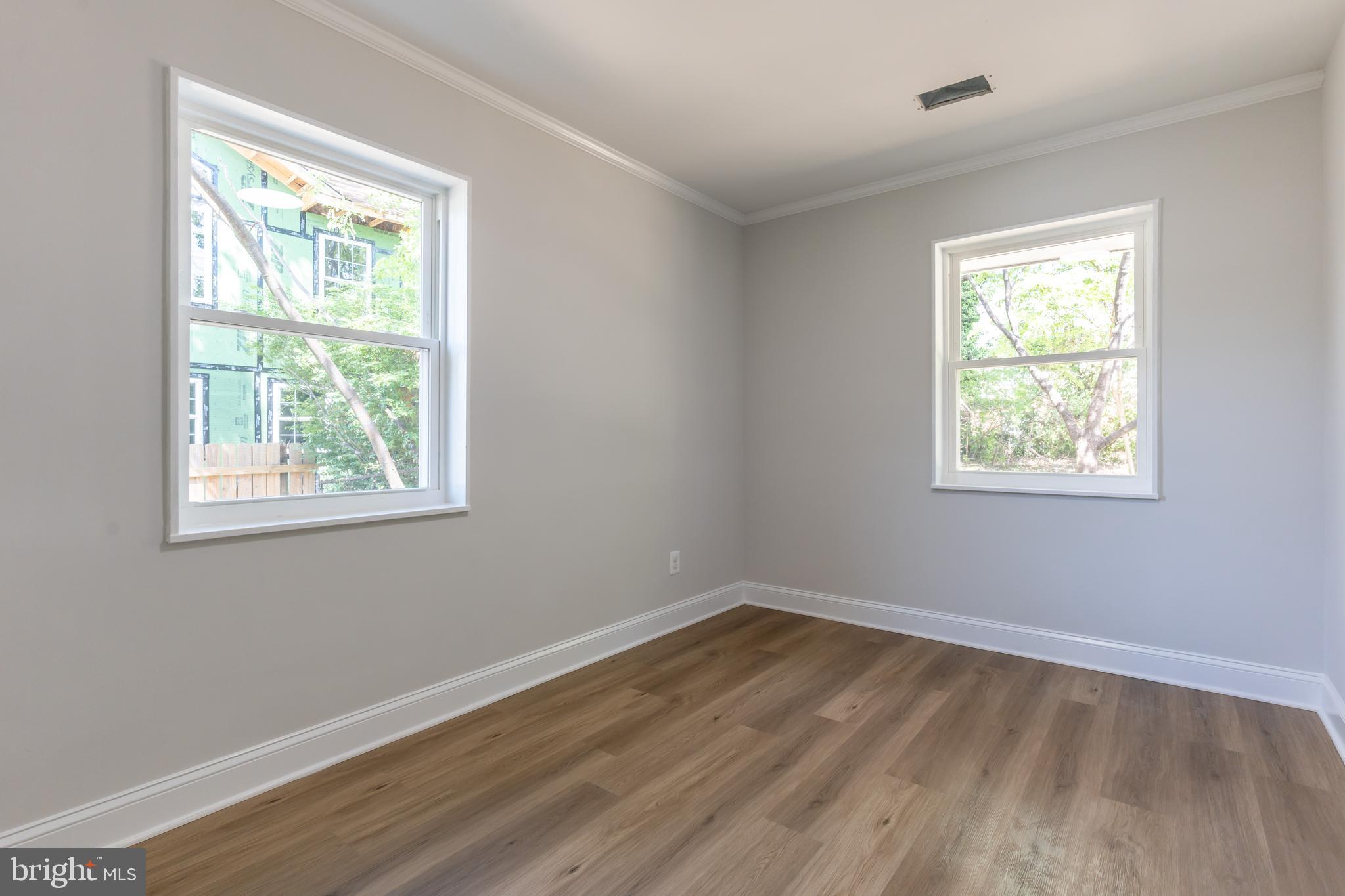 5506 Joplin Street Springfield, VA 22151 - Photo 8 of 32 a view of a room with wooden floor and windows