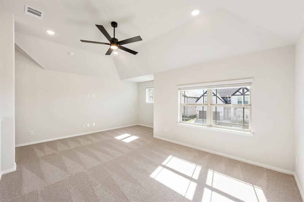 14422 McClint Street Pilot Point, TX 76258 - Photo 26 of 40 an empty room with windows and fan