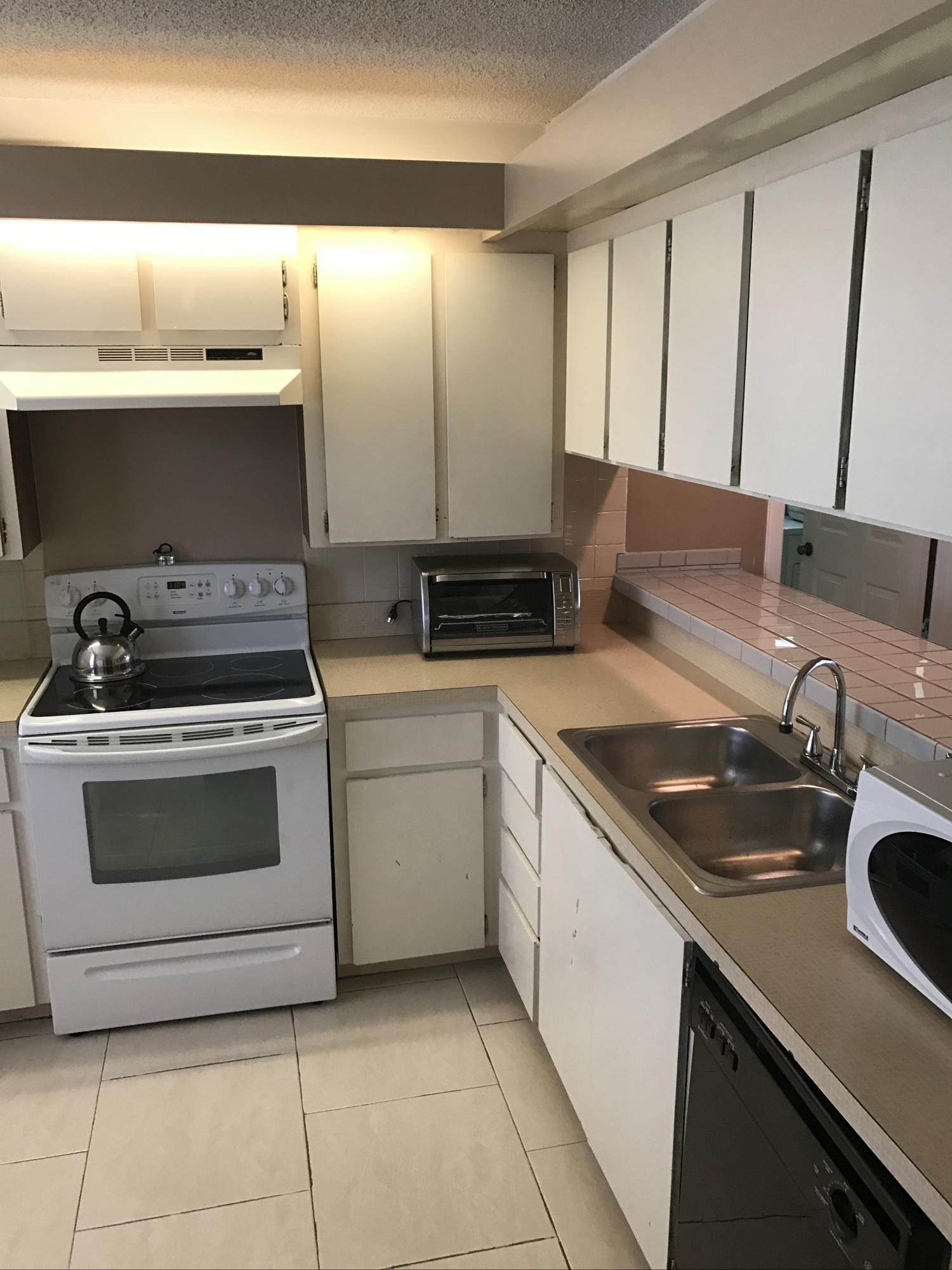 6037 Balboa Circle, Unit 204 Boca Raton, FL 33433 - Photo 4 of 18 kitchen 2
