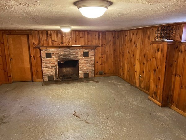679 Westhampton Road Northampton, MA 01062 - Photo 8 of 11 a view of a livingroom with a fireplace