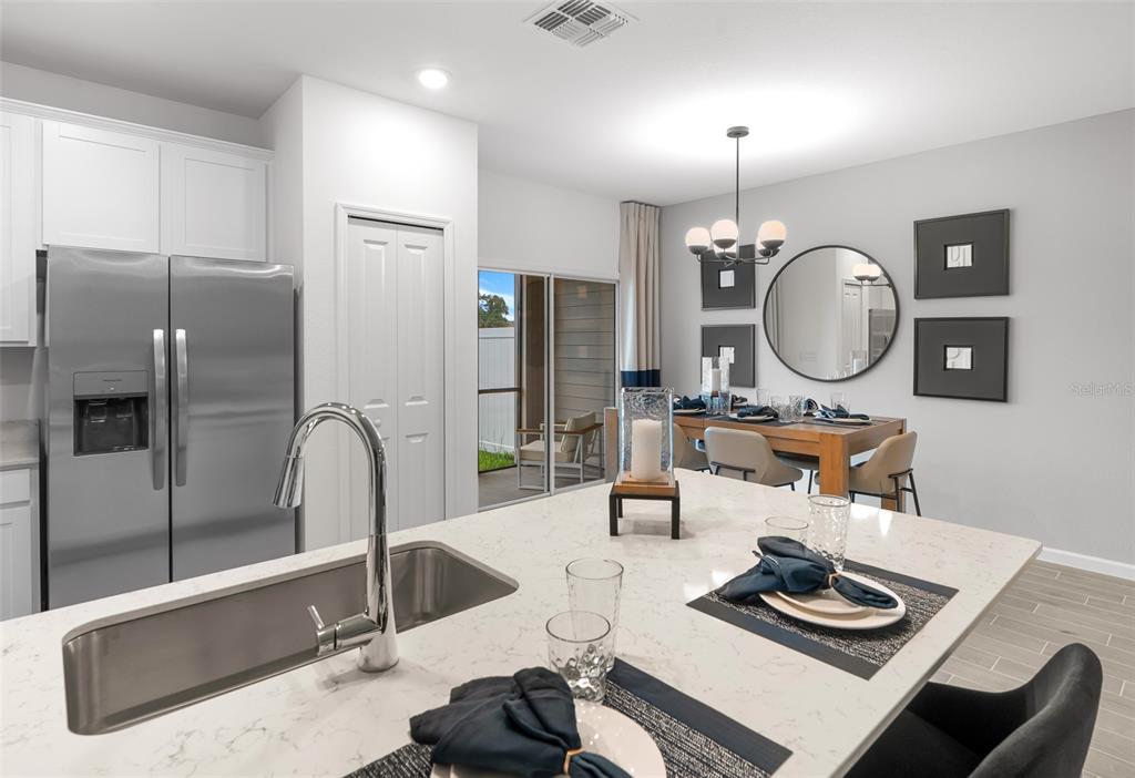 3639 Southeast 37th Ave Road Ocala, FL 34480 - Photo 19 of 61 a living room with furniture and a mirror